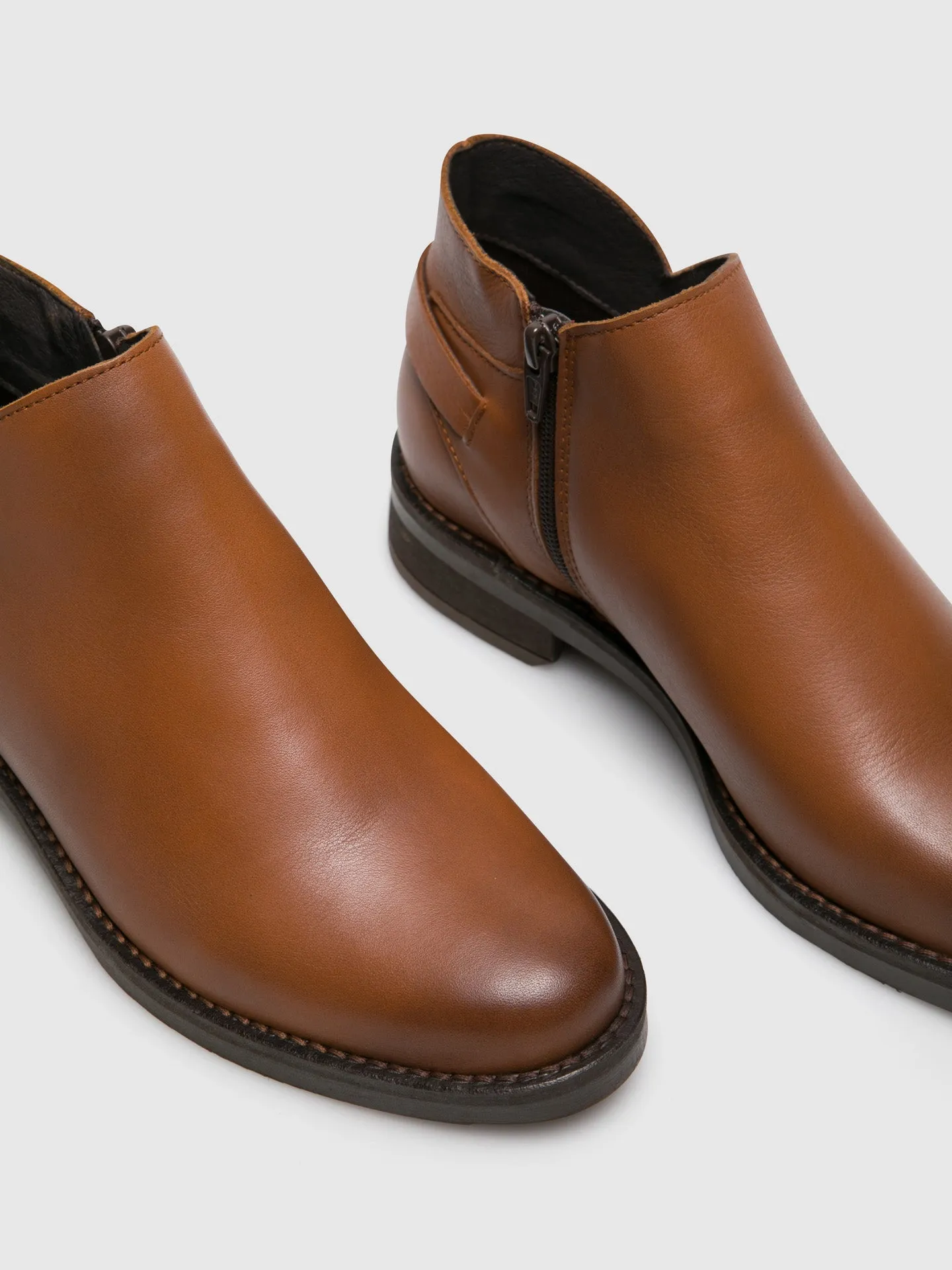 Peru Zip up Ankle Boots